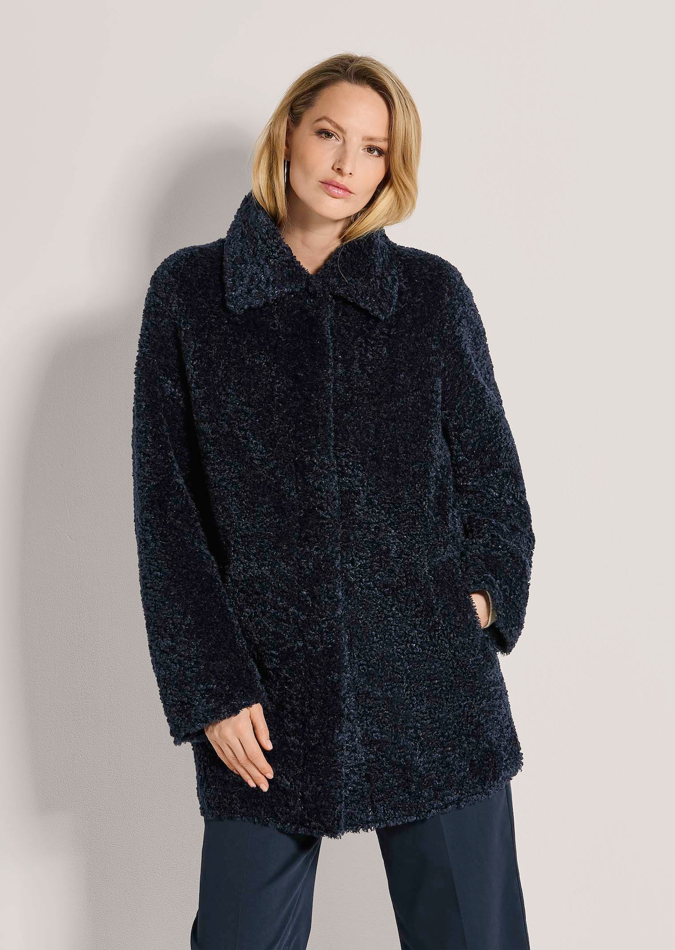 Modieuze teddy mantel