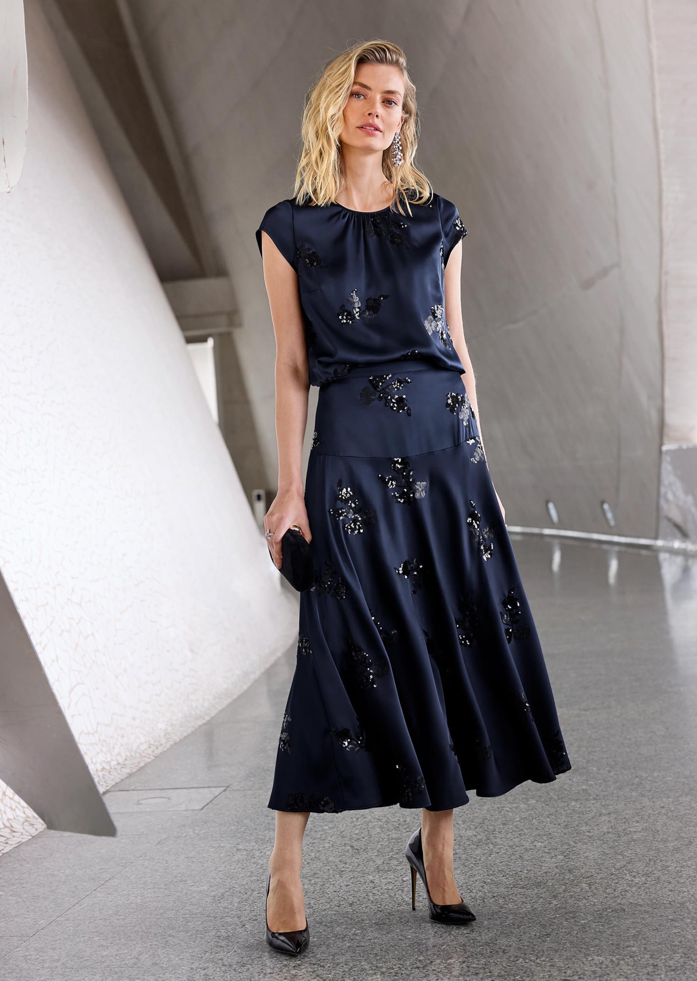 A-line satin skirt with sequin motifs