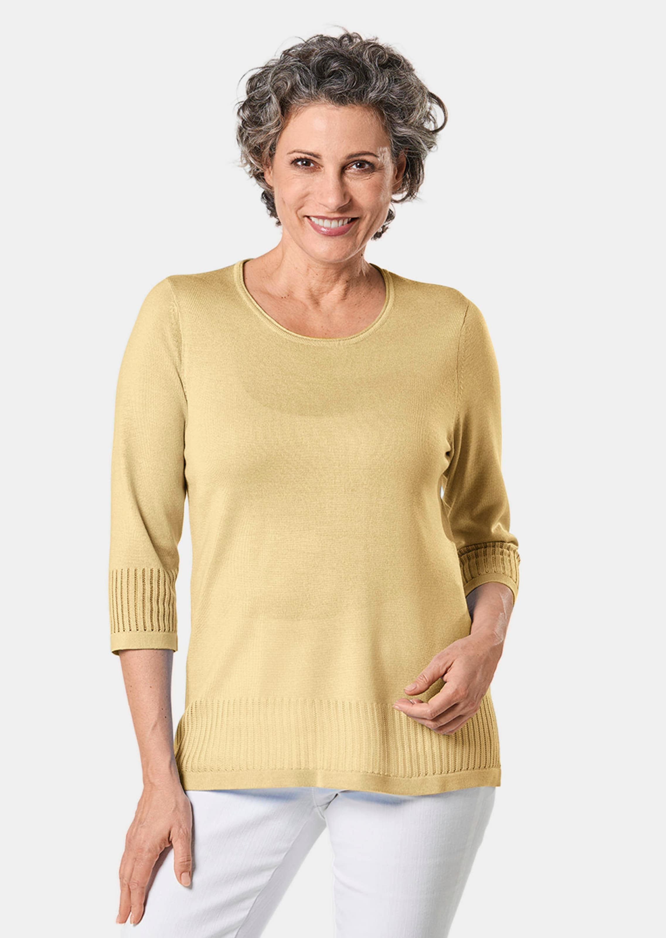 Verzorgde ajour pullover met vrouwelijke accenten