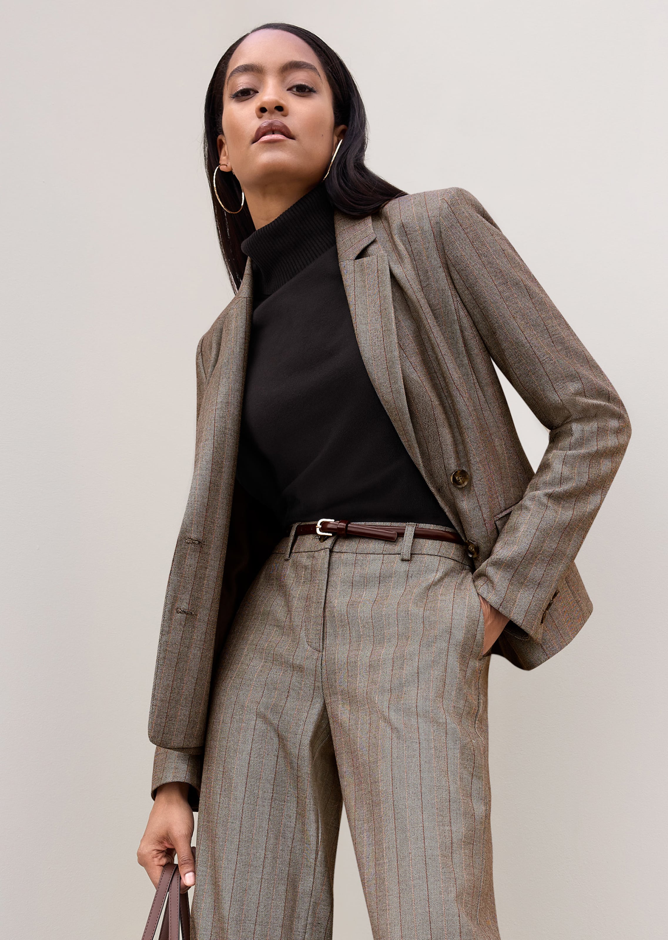 Double-breasted blazer with subtle stripes