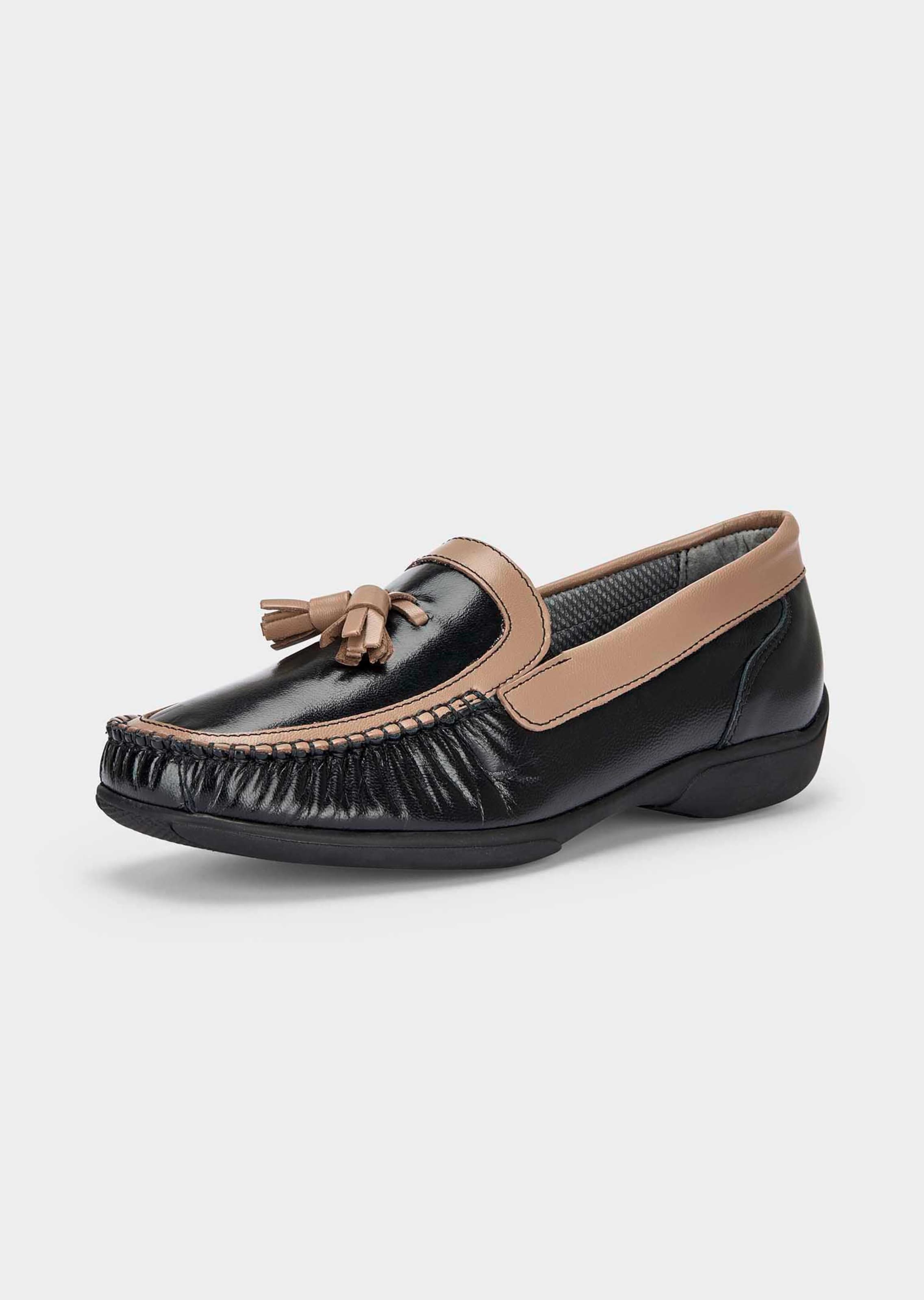 Mocassins en cuir avec pompons