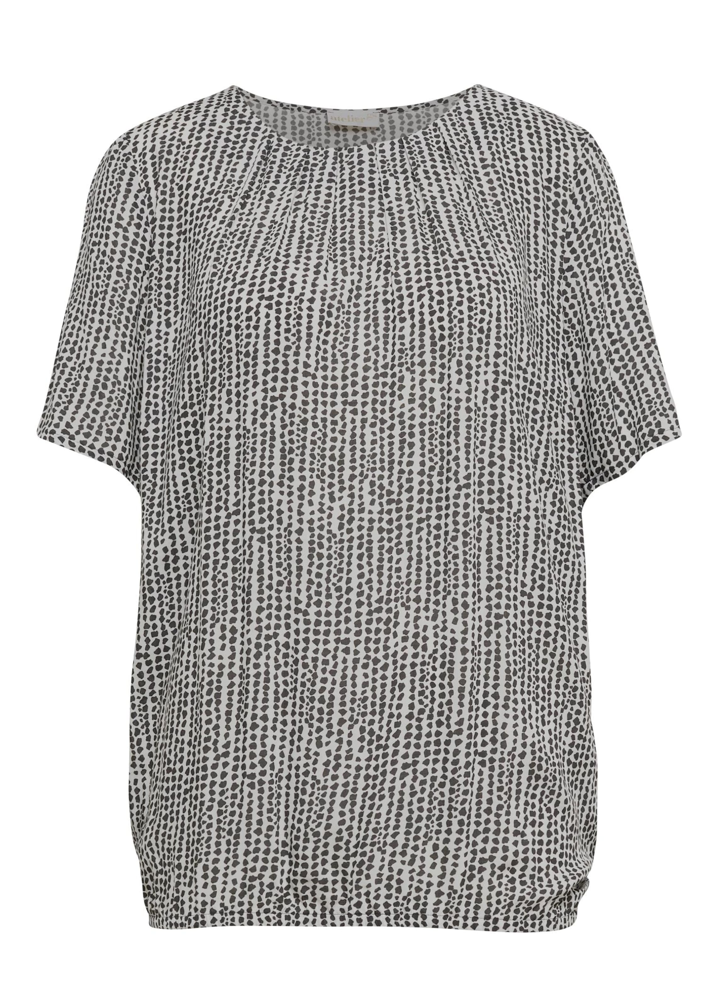 Farbbrillante Druckbluse mit liebevollen Details
