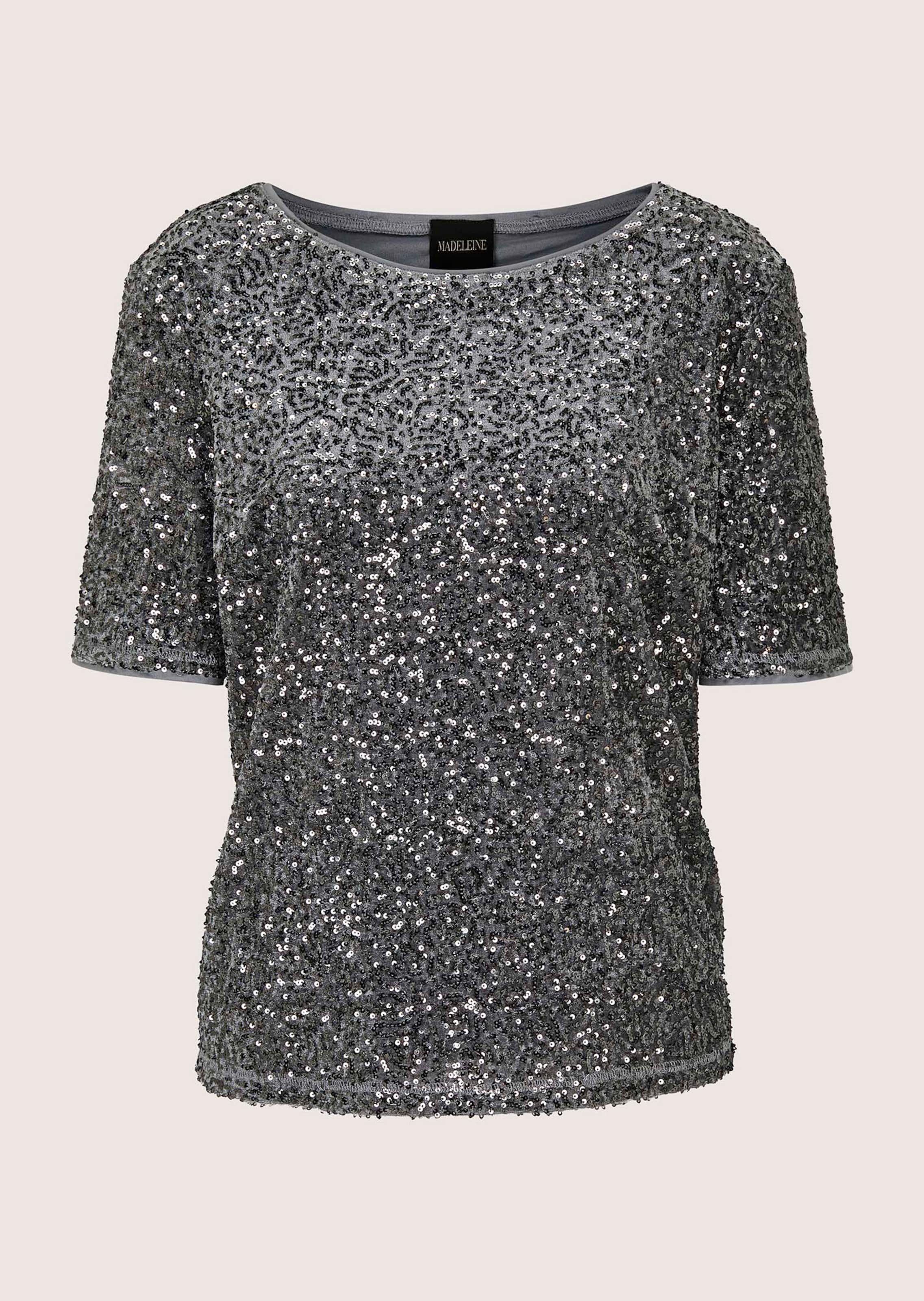 Sequinned top with half sleeves