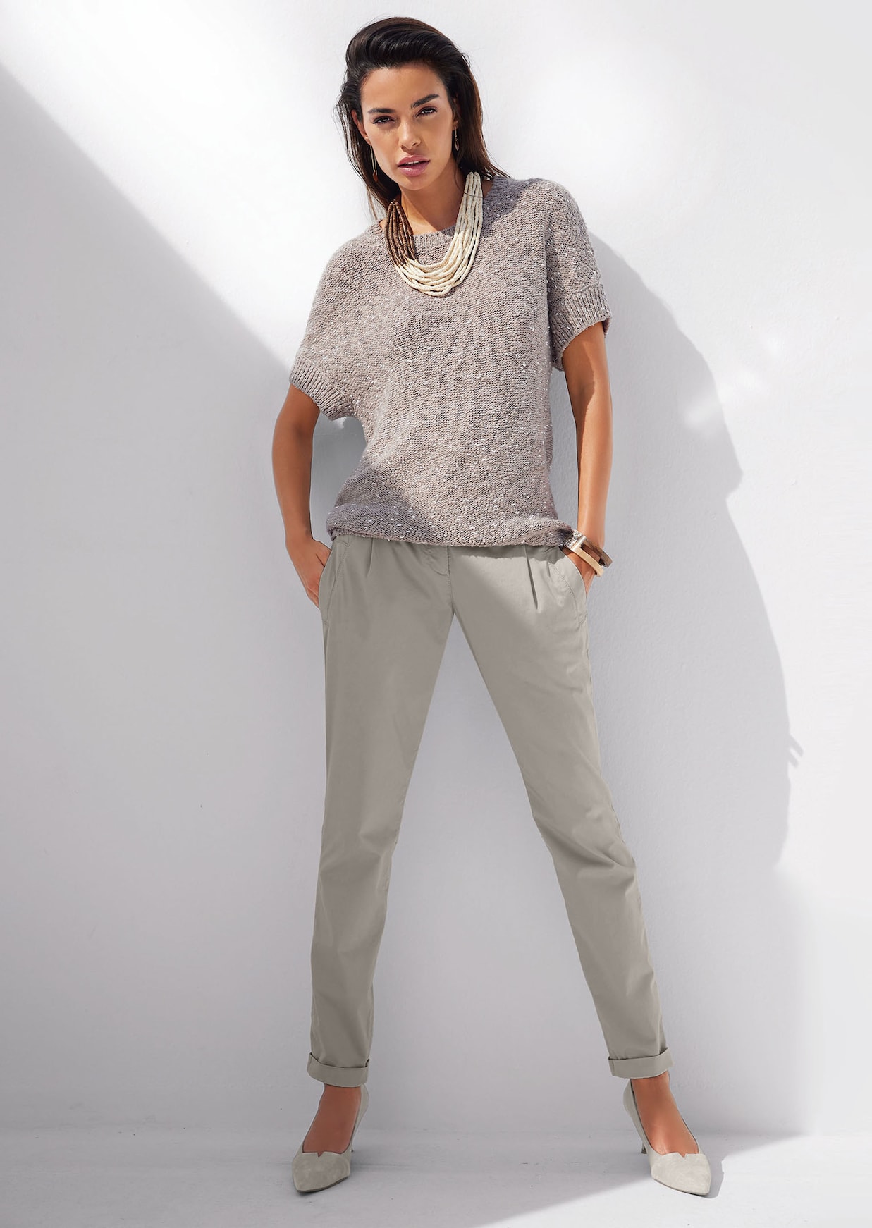 Chino broek met plooien