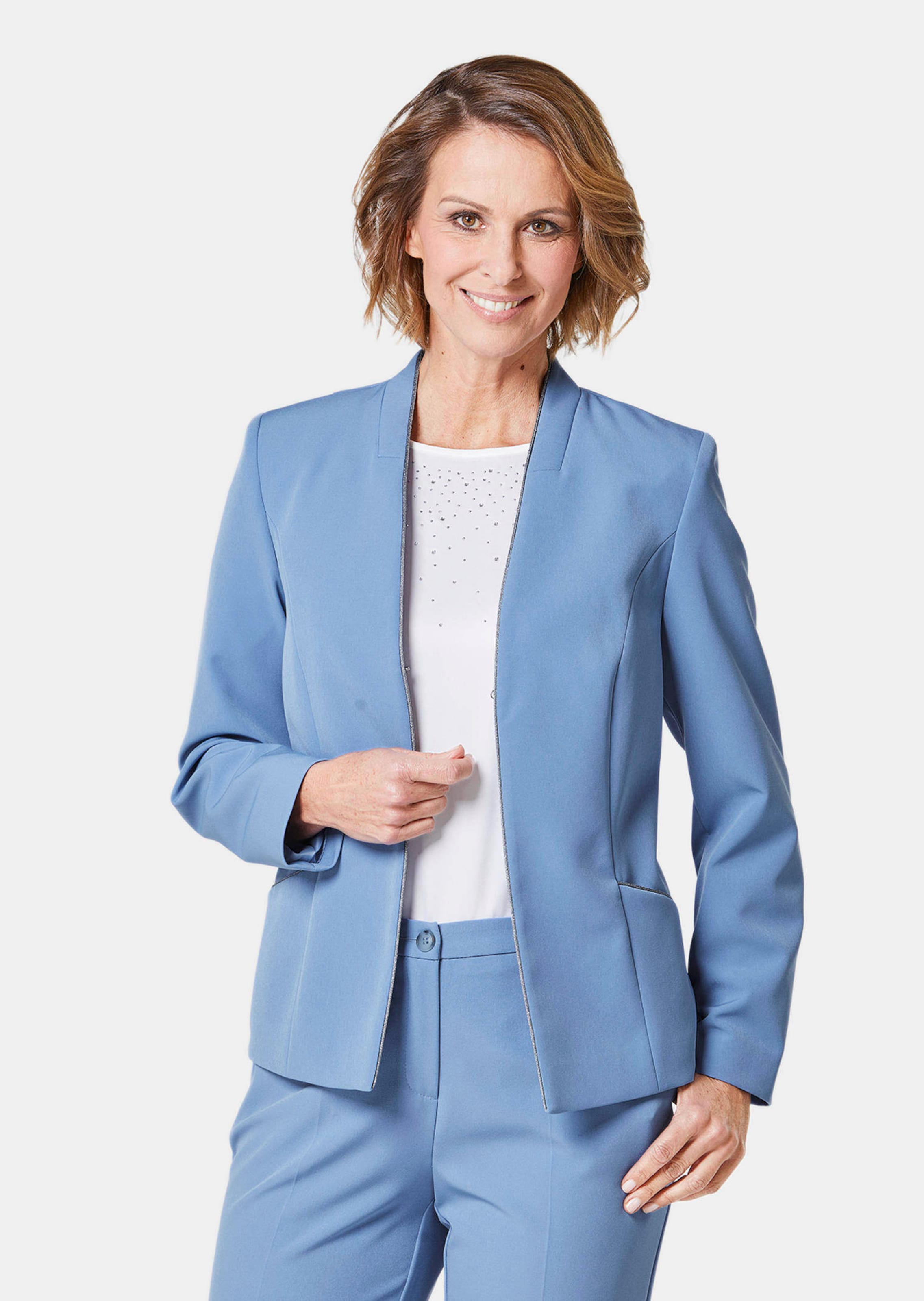 Blazer agrémenté de passepoils contrastants