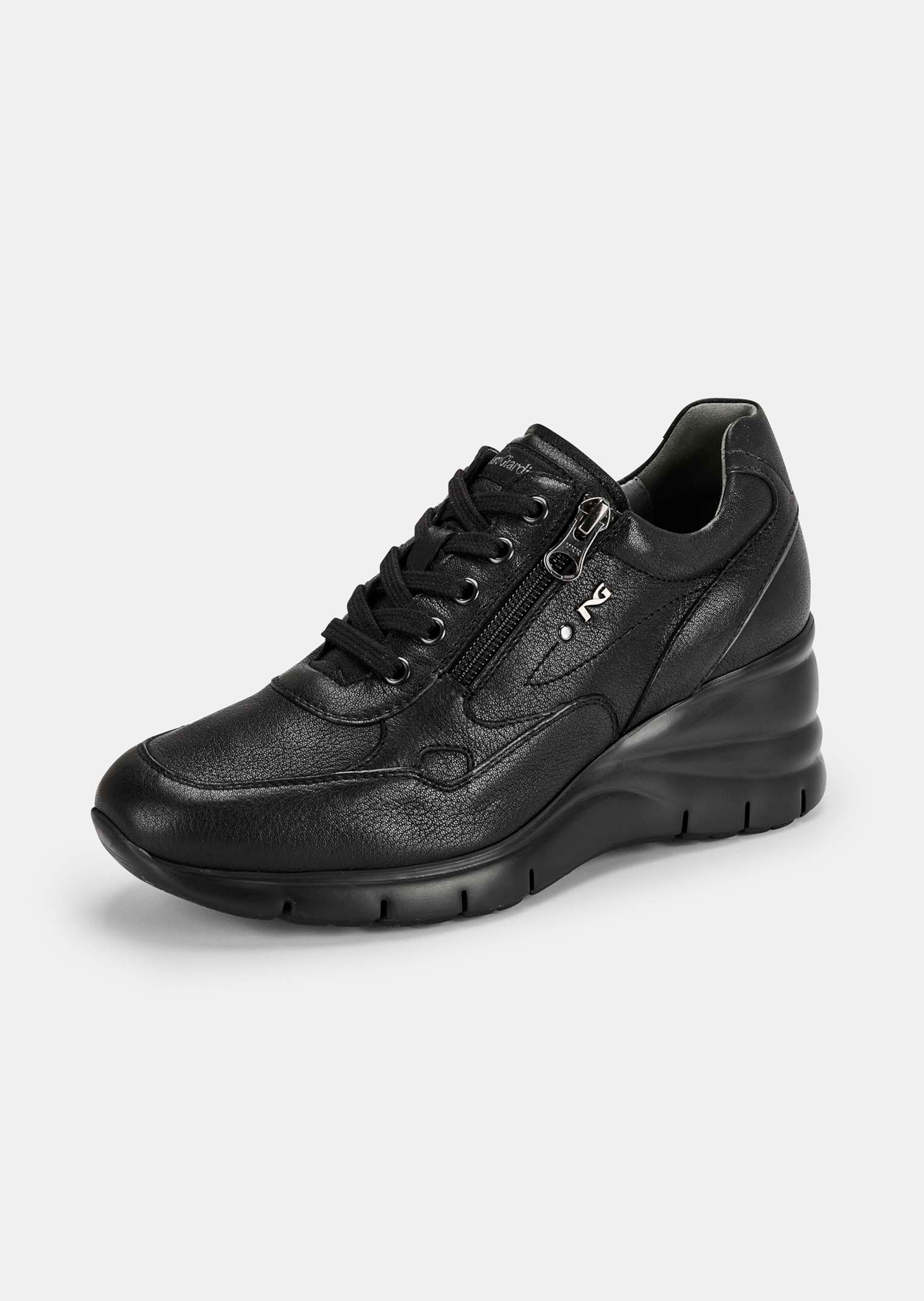 Trainers with an integrated wedge heel