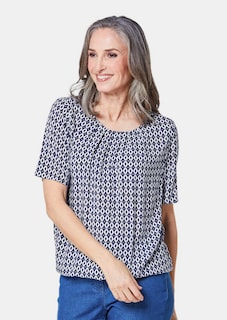 Helder gekleurde, gedessineerde blouse met charmante details thumbnail 1