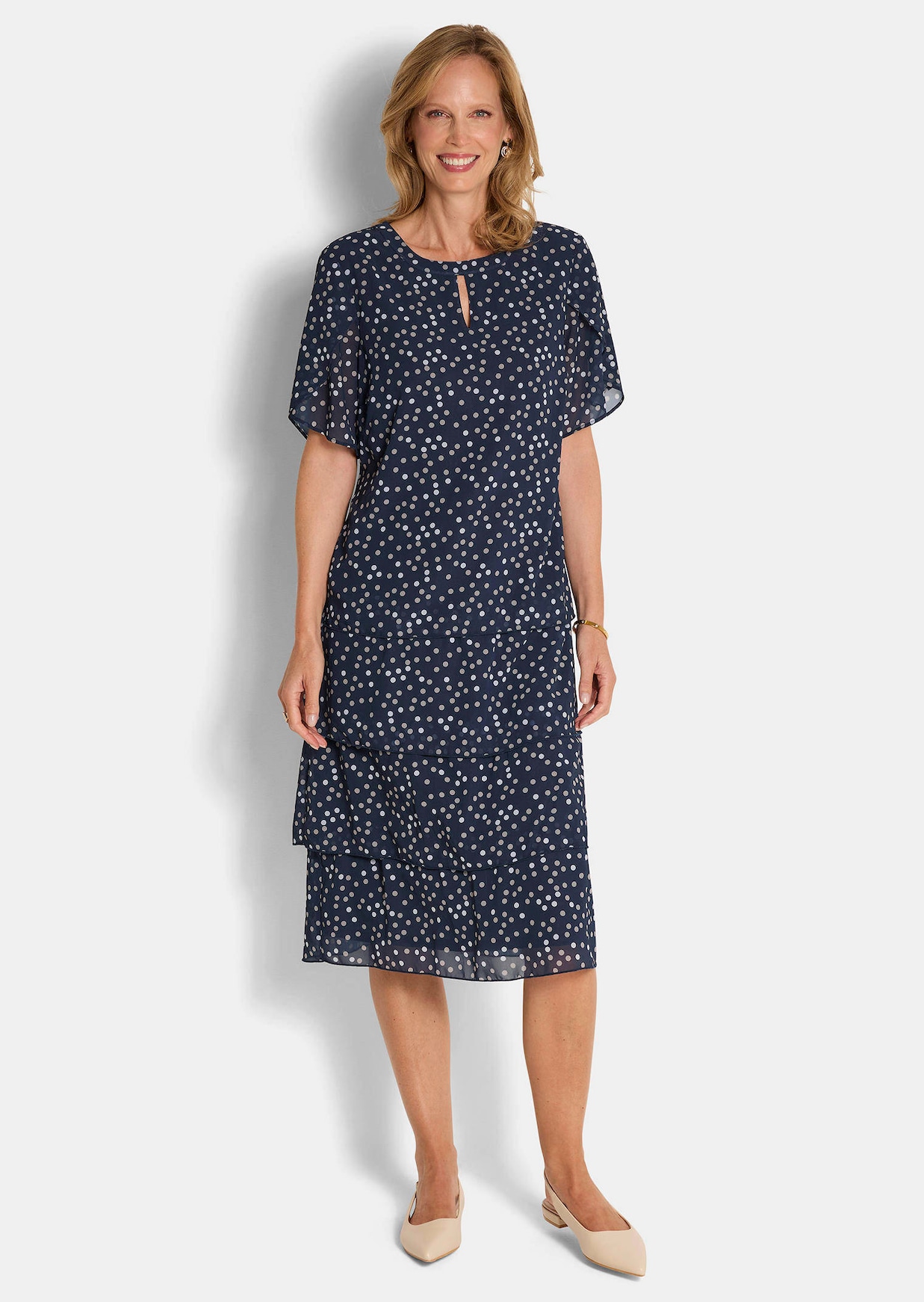 Robe à pois travaillée sur pans