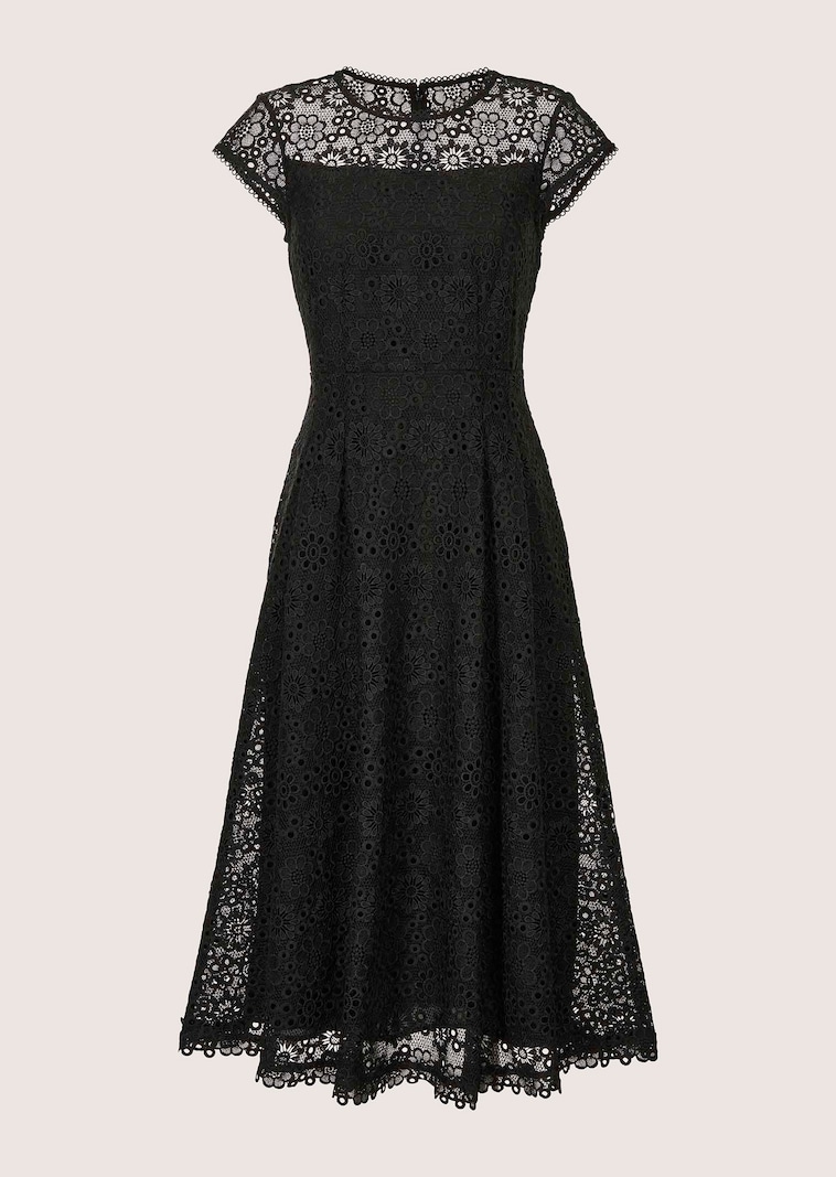 Sleeveless lace dress with tie ribbon and wide skirt