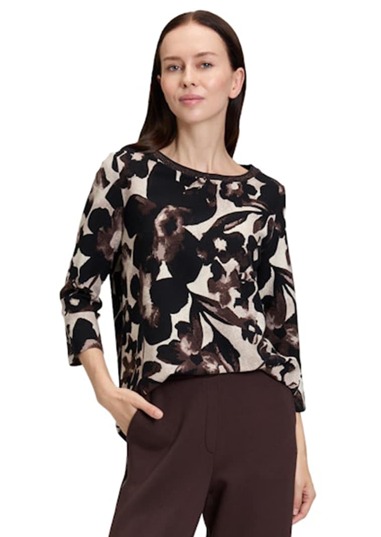 Blouse fluide dense et structurée