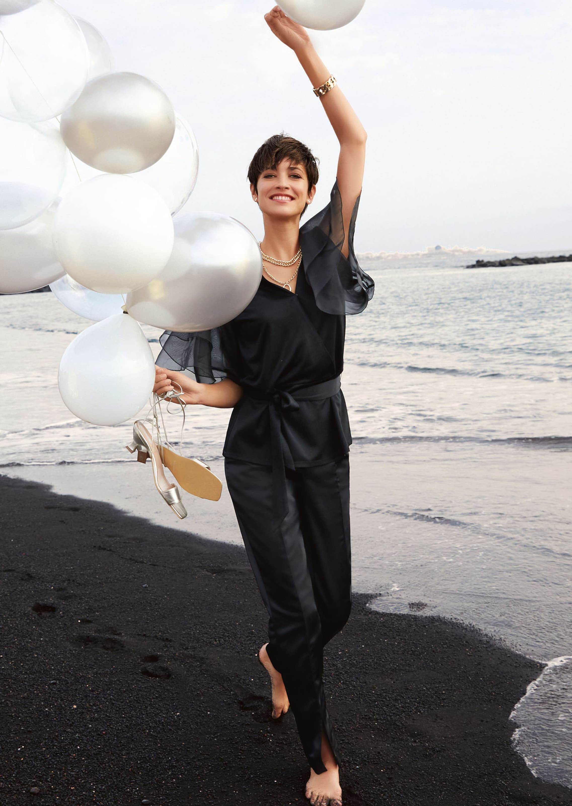 Bluse im Metallic-Look mit transparenten Ärmeln