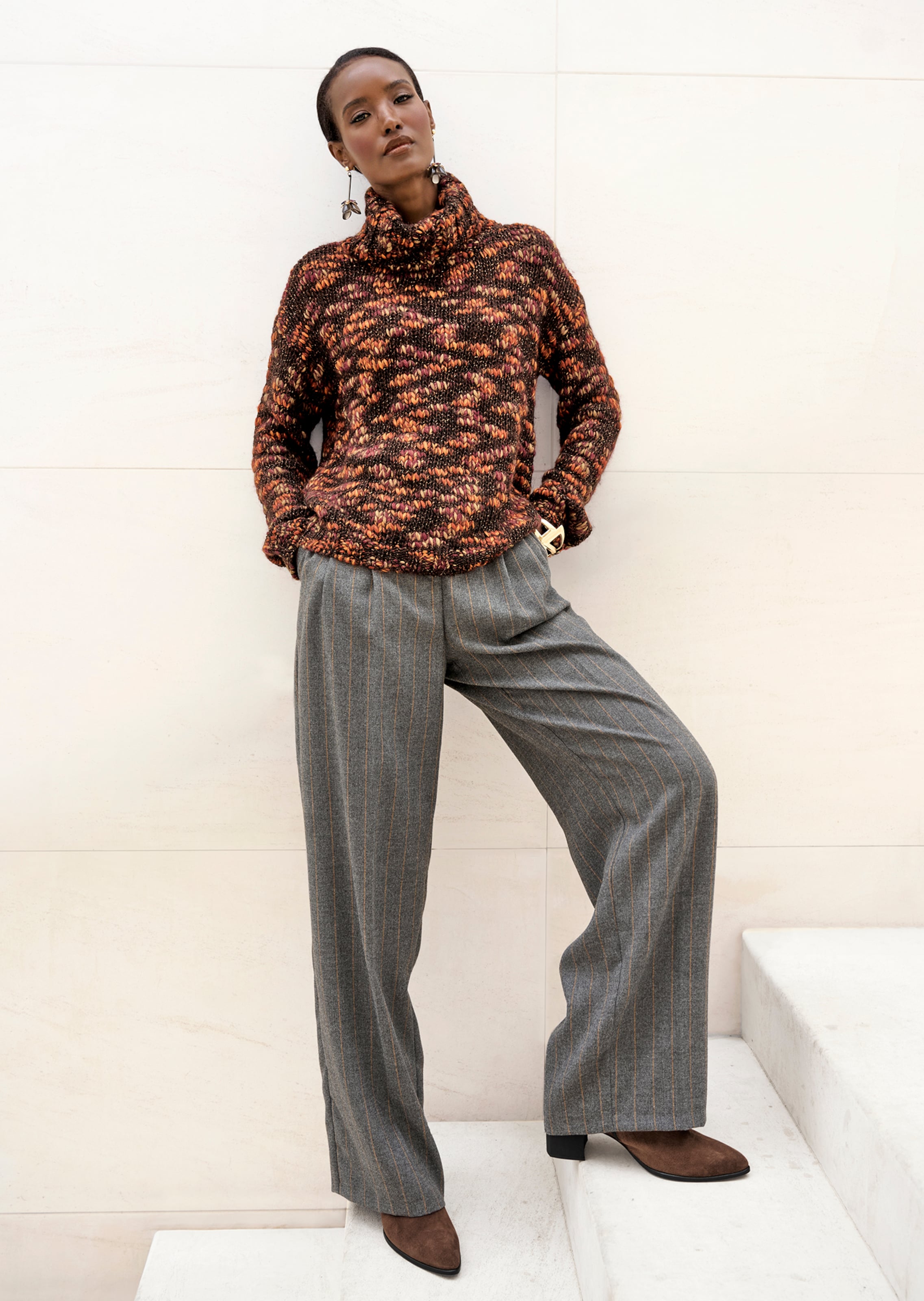 Rollkragenpullover in Melange-Optik
