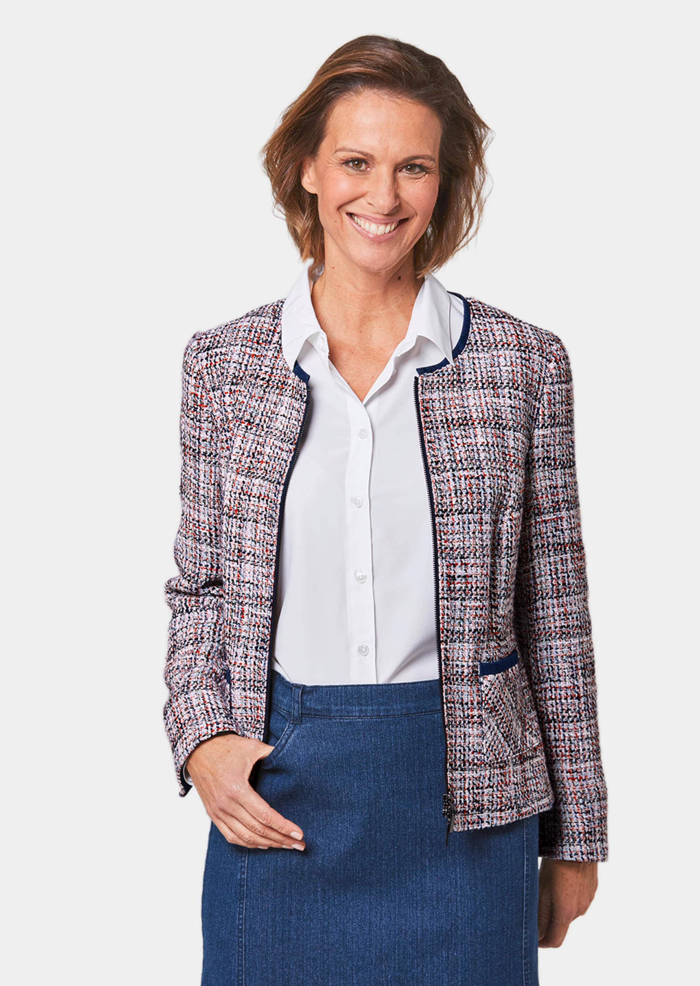Chique boucléblazer met biesjes van denim