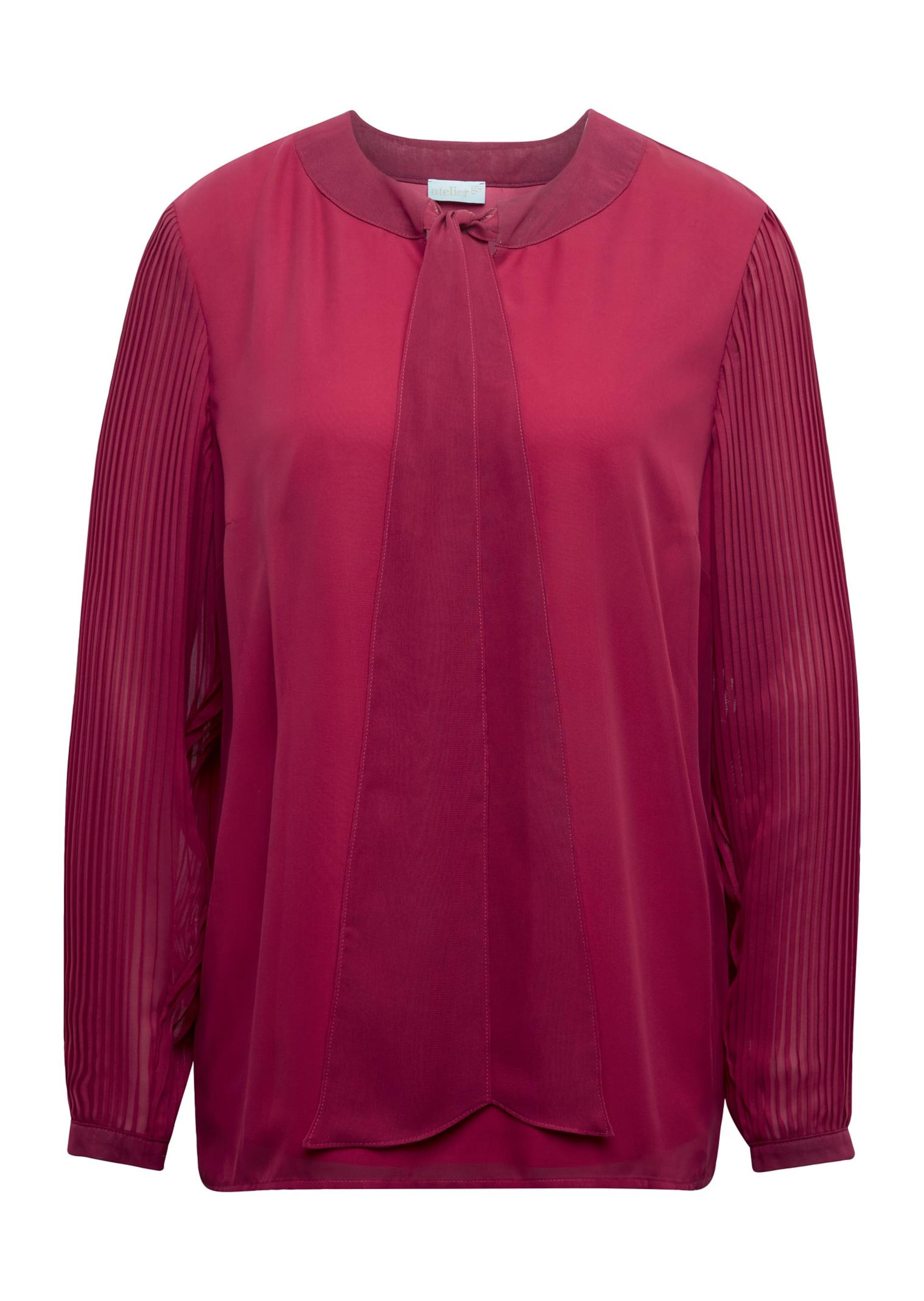 Schluppenbluse mit aufregenden Plisseedetails